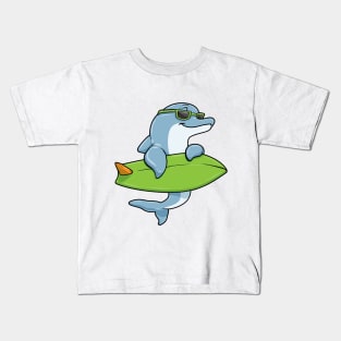 Dolphin with Sunglasses as Surfer with Surfboard Kids T-Shirt